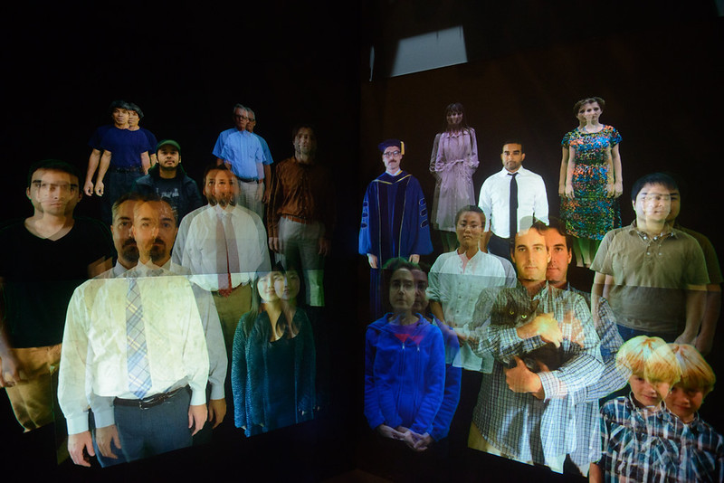 Stereoscopic digital crowd projected across two walls of the CrowdCave