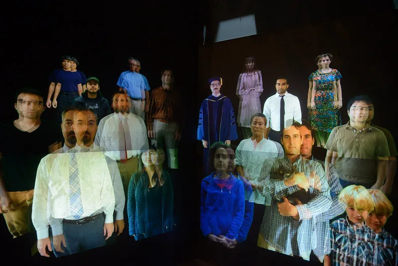 Stereoscopic digital crowd projected across two walls of the CrowdCave